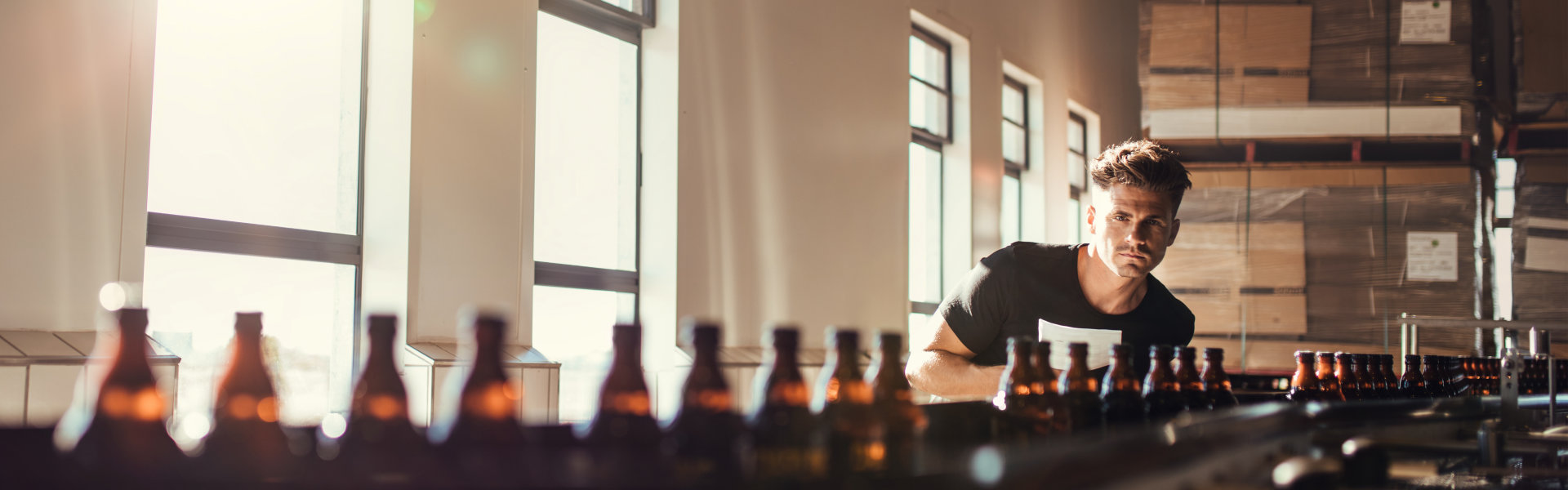Craft Brewery Brew Master Checking The Production Of Beer