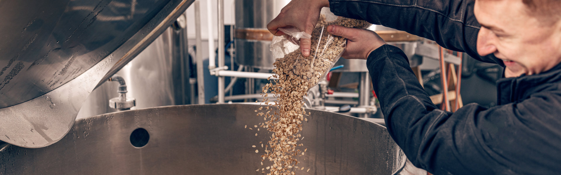 Craft Brewery Brewing Staff Putting Brewers Malt To Mixing Equipment